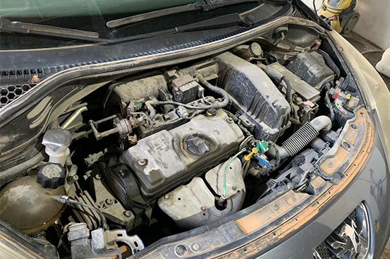 Engine bay before cleaning
