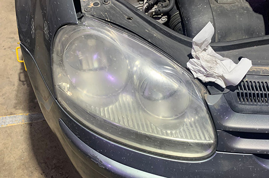 Cloudy headlight before polishing